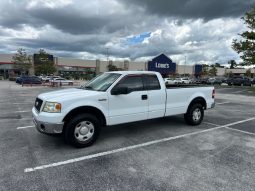 2006 Ford f150 v8 long bed ( low mileage )+-4doors full