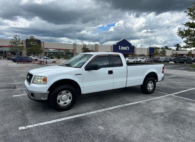 2006 Ford f150 v8 long bed ( low mileage )+-4doors full
