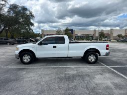 2006 Ford f150 v8 long bed ( low mileage )+-4doors full