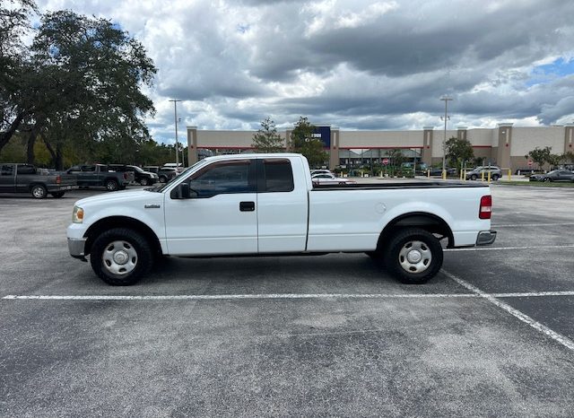 2006 Ford f150 v8 long bed ( low mileage )+-4doors full