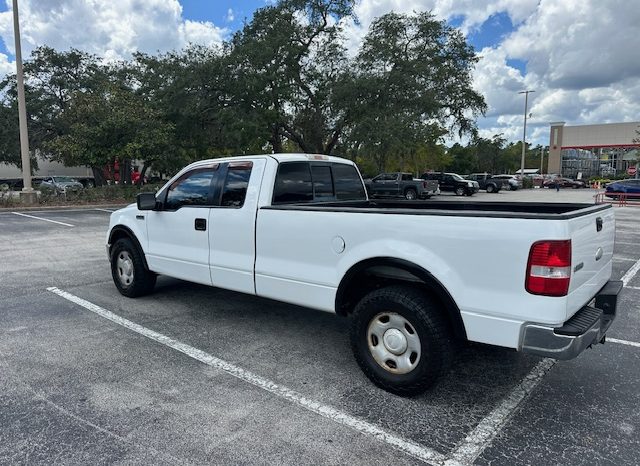 2006 Ford f150 v8 long bed ( low mileage )+-4doors full