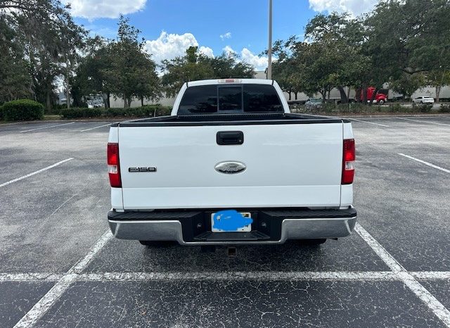 2006 Ford f150 v8 long bed ( low mileage )+-4doors full