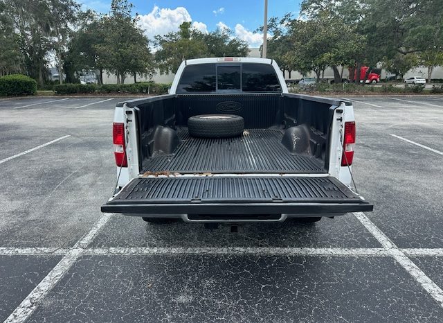2006 Ford f150 v8 long bed ( low mileage )+-4doors full