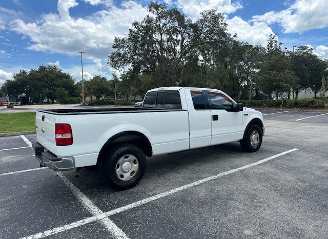 2006 Ford f150 v8 long bed ( low mileage )+-4doors full