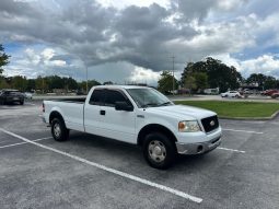 2006 Ford f150 v8 long bed ( low mileage )+-4doors full