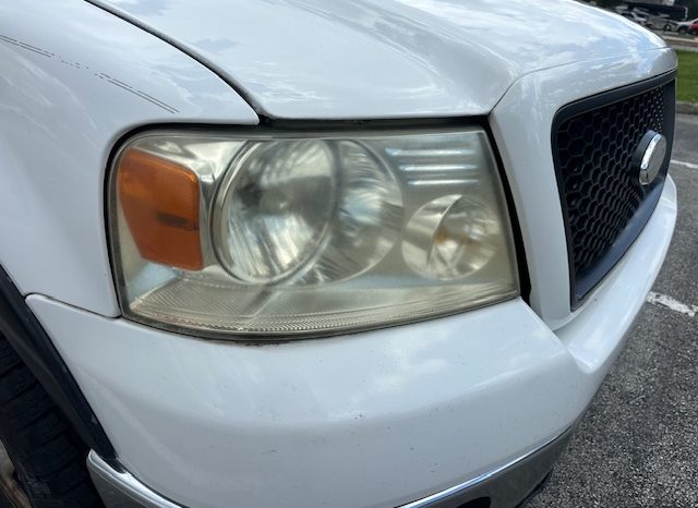2006 Ford f150 v8 long bed ( low mileage )+-4doors full