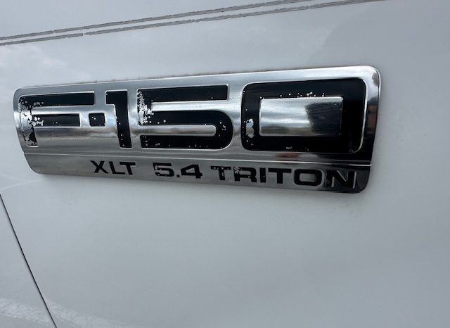 2006 Ford f150 v8 long bed ( low mileage )+-4doors full
