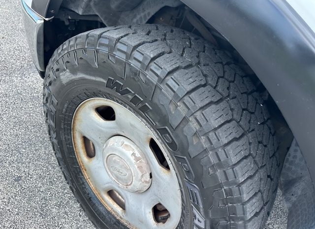 2006 Ford f150 v8 long bed ( low mileage )+-4doors full