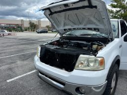 2006 Ford f150 v8 long bed ( low mileage )+-4doors full