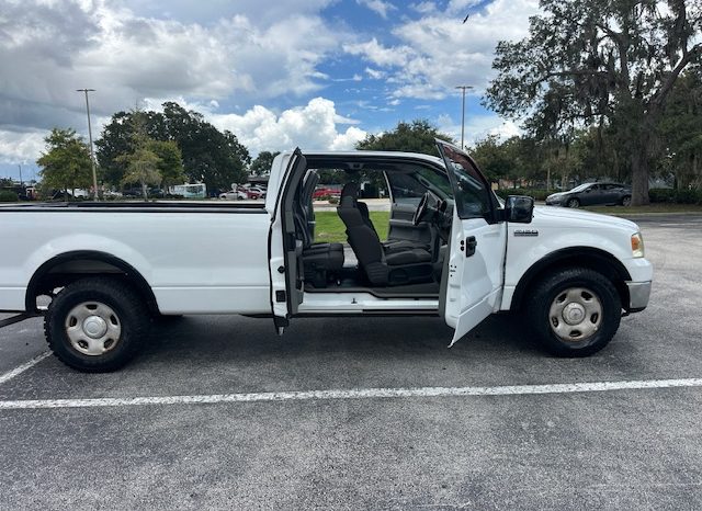2006 Ford f150 v8 long bed ( low mileage )+-4doors full