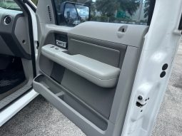 2006 Ford f150 v8 long bed ( low mileage )+-4doors full