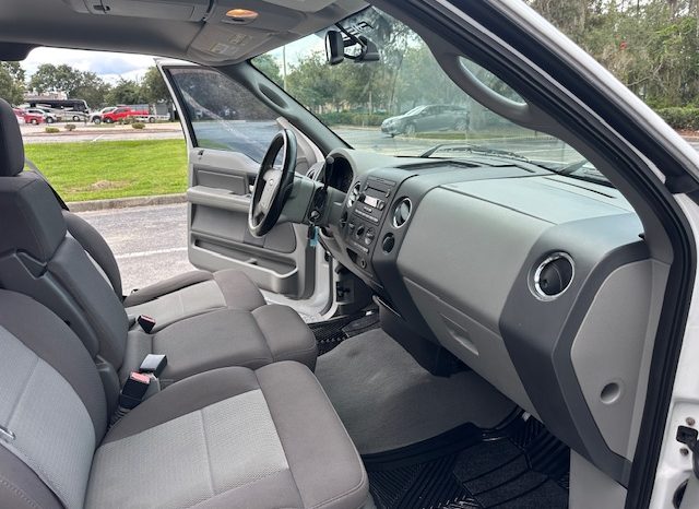 2006 Ford f150 v8 long bed ( low mileage )+-4doors full
