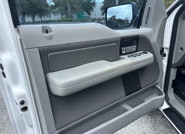 2006 Ford f150 v8 long bed ( low mileage )+-4doors full