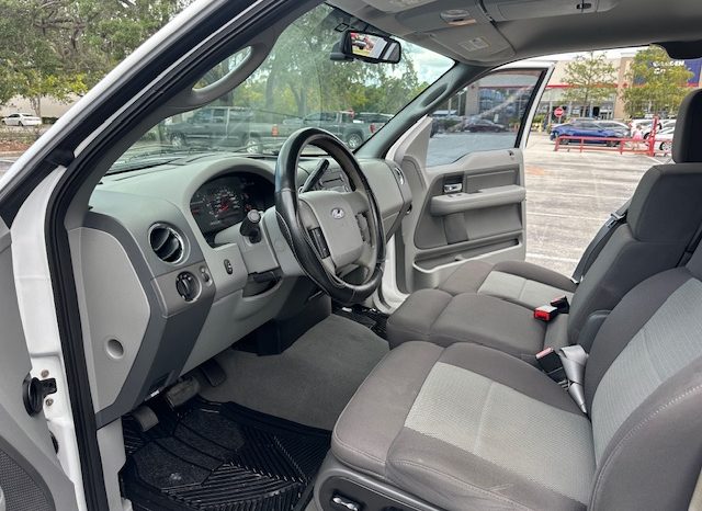 2006 Ford f150 v8 long bed ( low mileage )+-4doors full