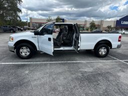 2006 Ford f150 v8 long bed ( low mileage )+-4doors full